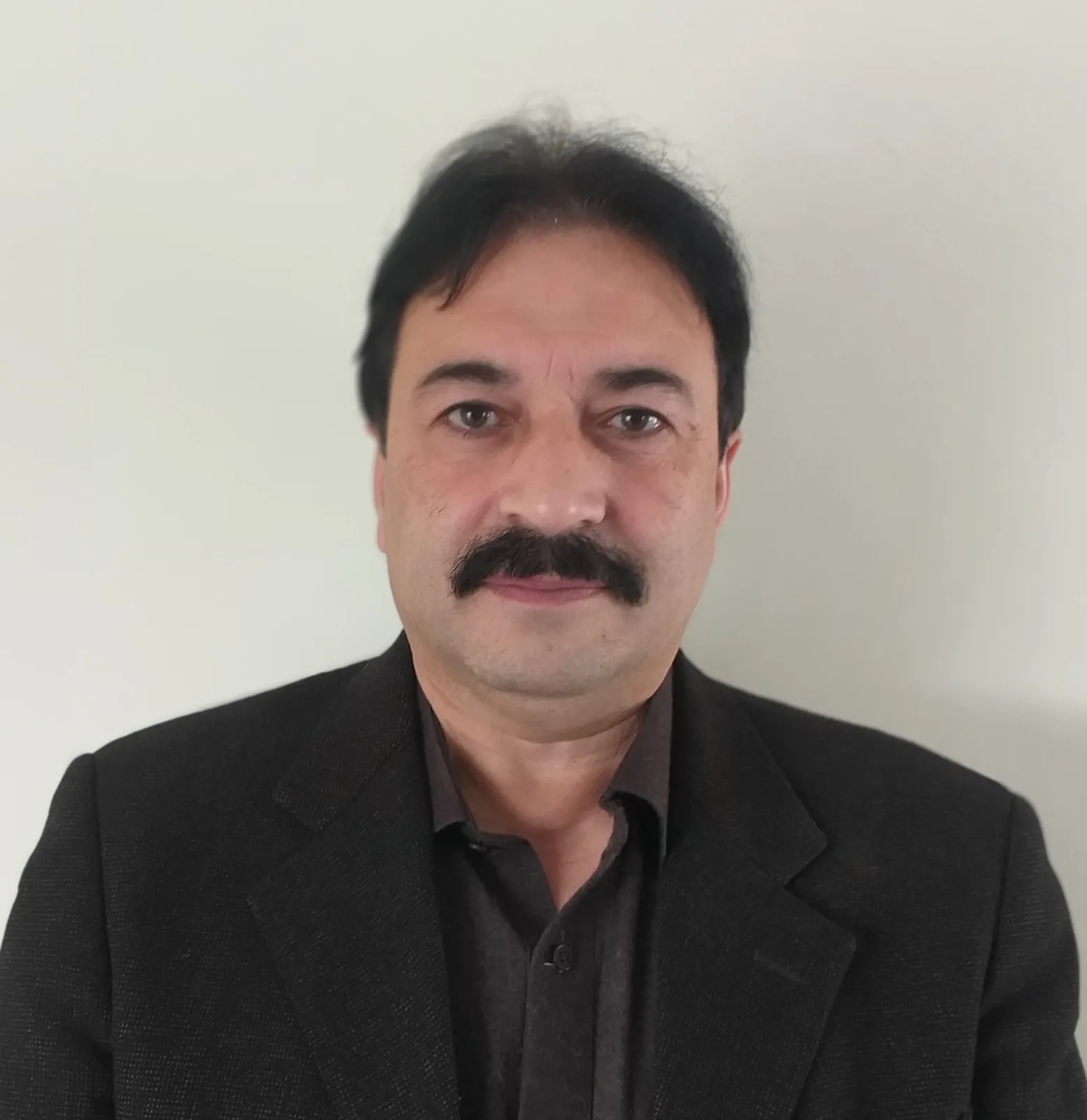 Registrar - Dr. Syed Tahir Ali Shah